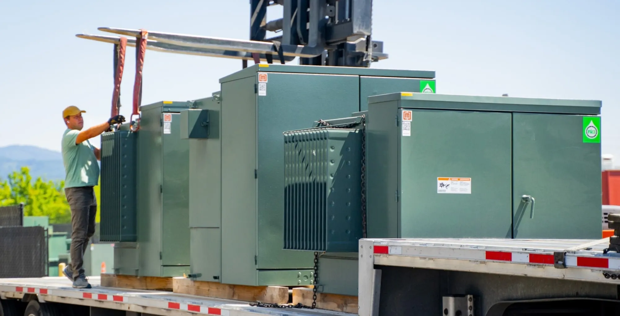Maddox reconditioned padmount transformers filled with FR3® fluid headed to a customer’s project in Minnesota