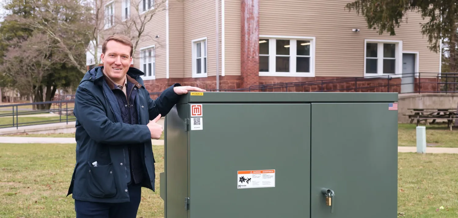 Prime Rock Principle poses next to his new Maddox Padmount
