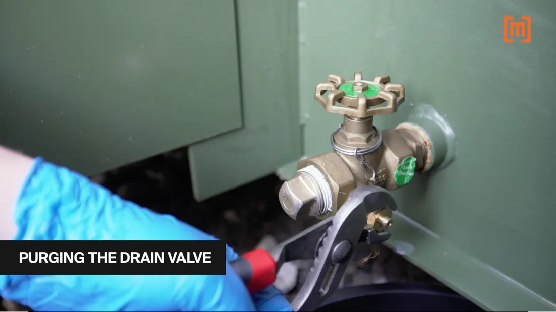 purging the padmount transformer drain valve before taking a DGA oil test
