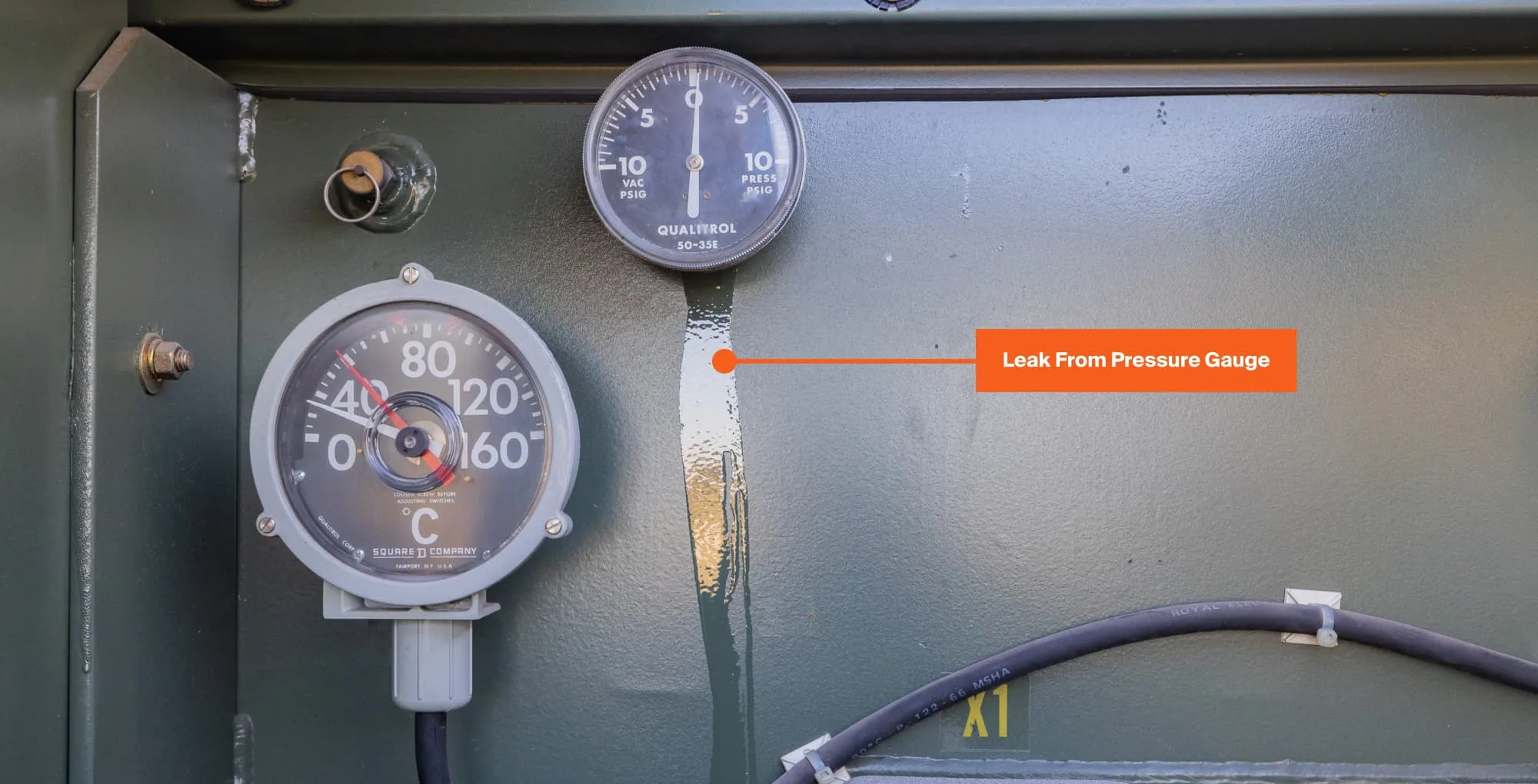 A transformer oil leak from a pressure gauge