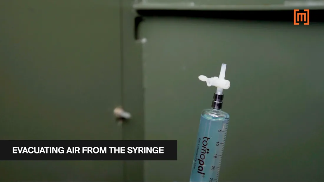 Picture of the DGA test oil in a syringe