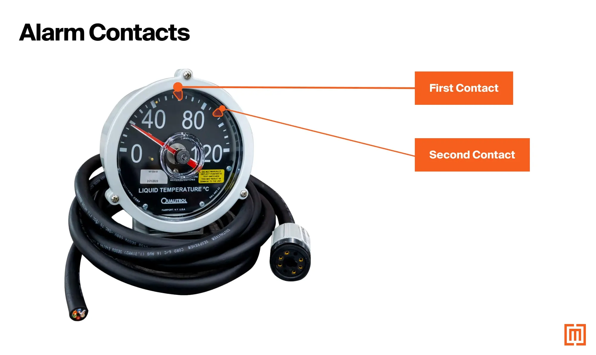A transformer liquid temperature gauge with alarm contacts.