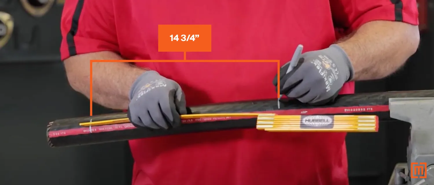 Technician measures 14 3/4 inches from the original mark