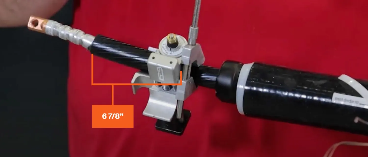 Technician scores semiconductor screen of cable to reveal the insulation