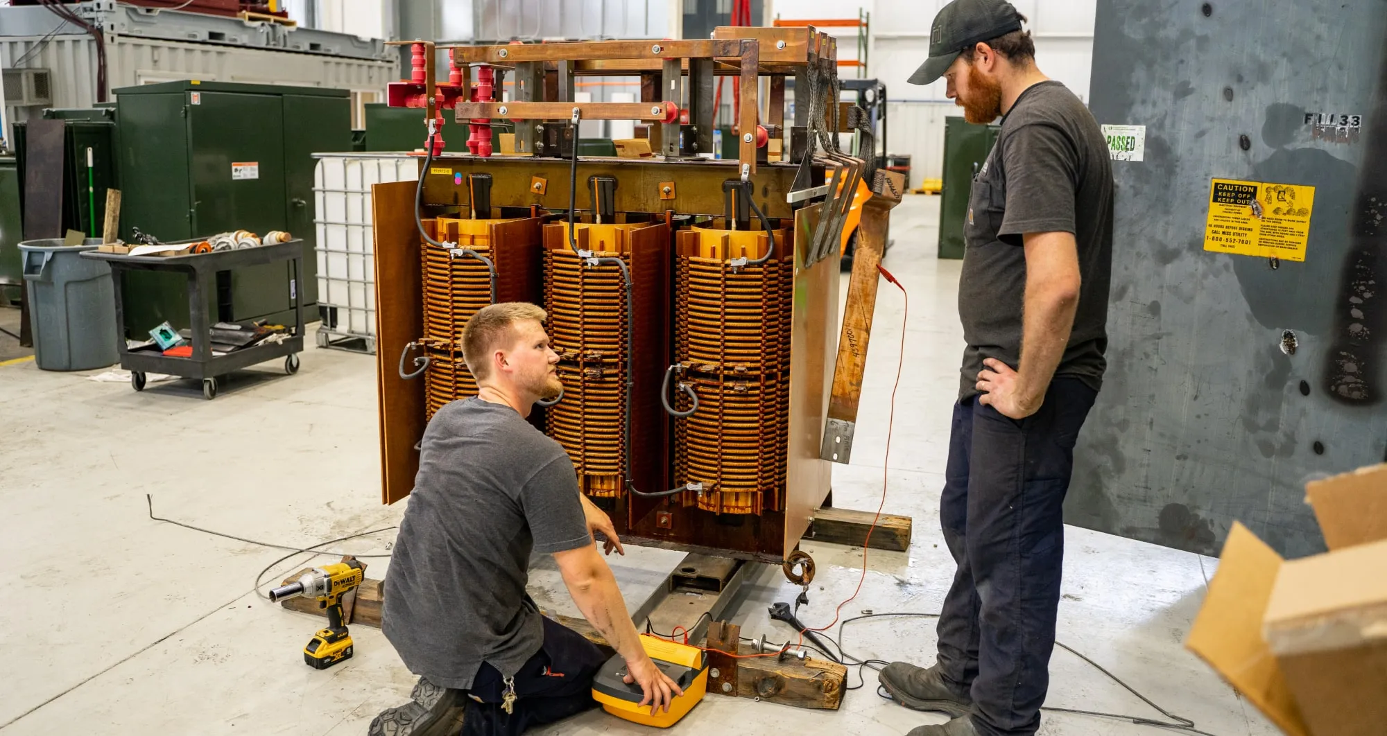 Maddox technicians taking a megger test on a dry type transformer.