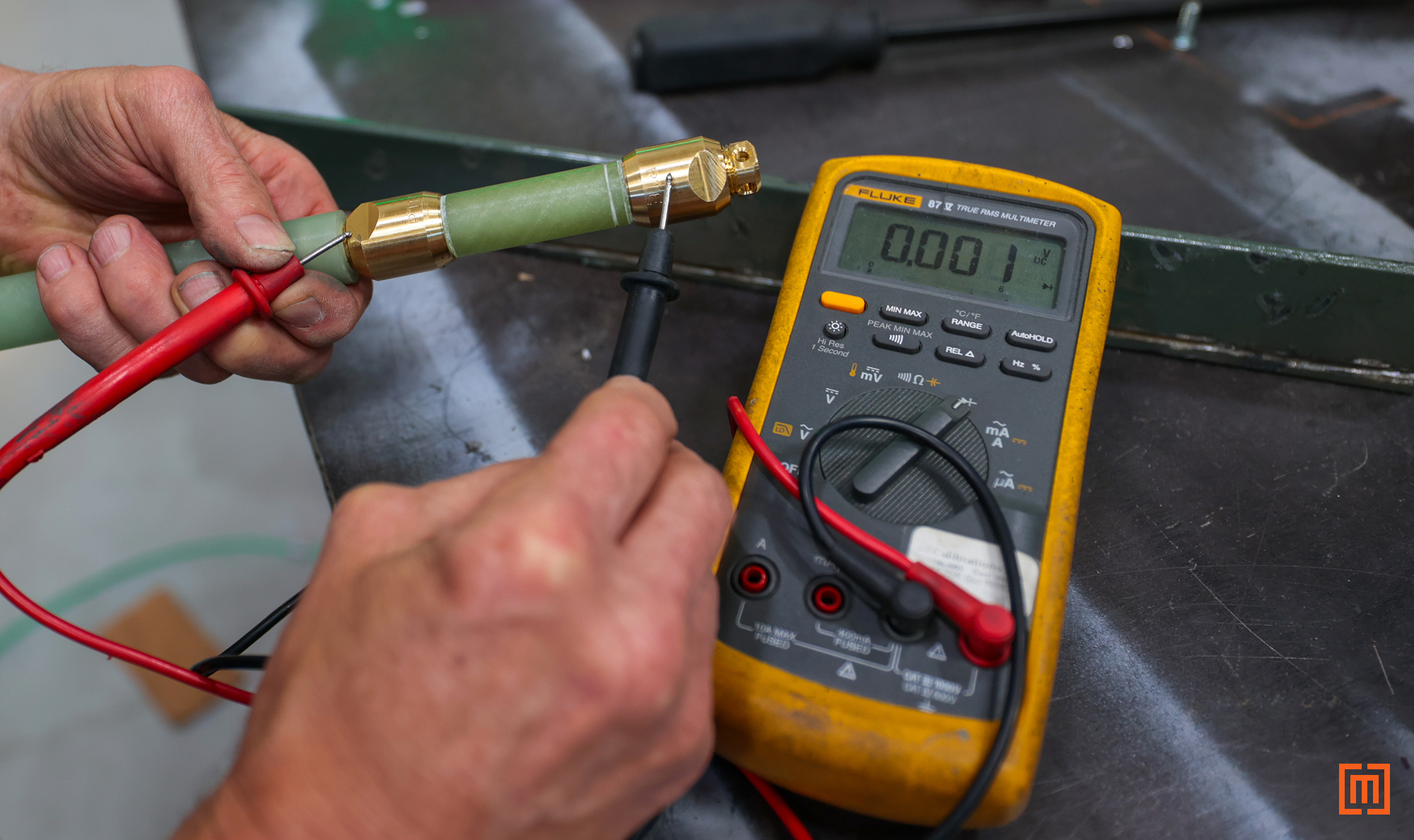 photo of tech testing bayonet fuse