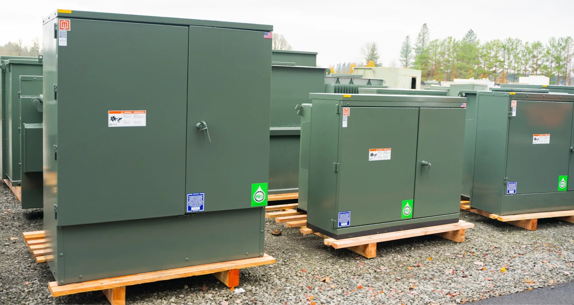 Padmounts filled with FR3® fluid waiting in Maddox's Battle Ground, WA yard to be shipped to customers