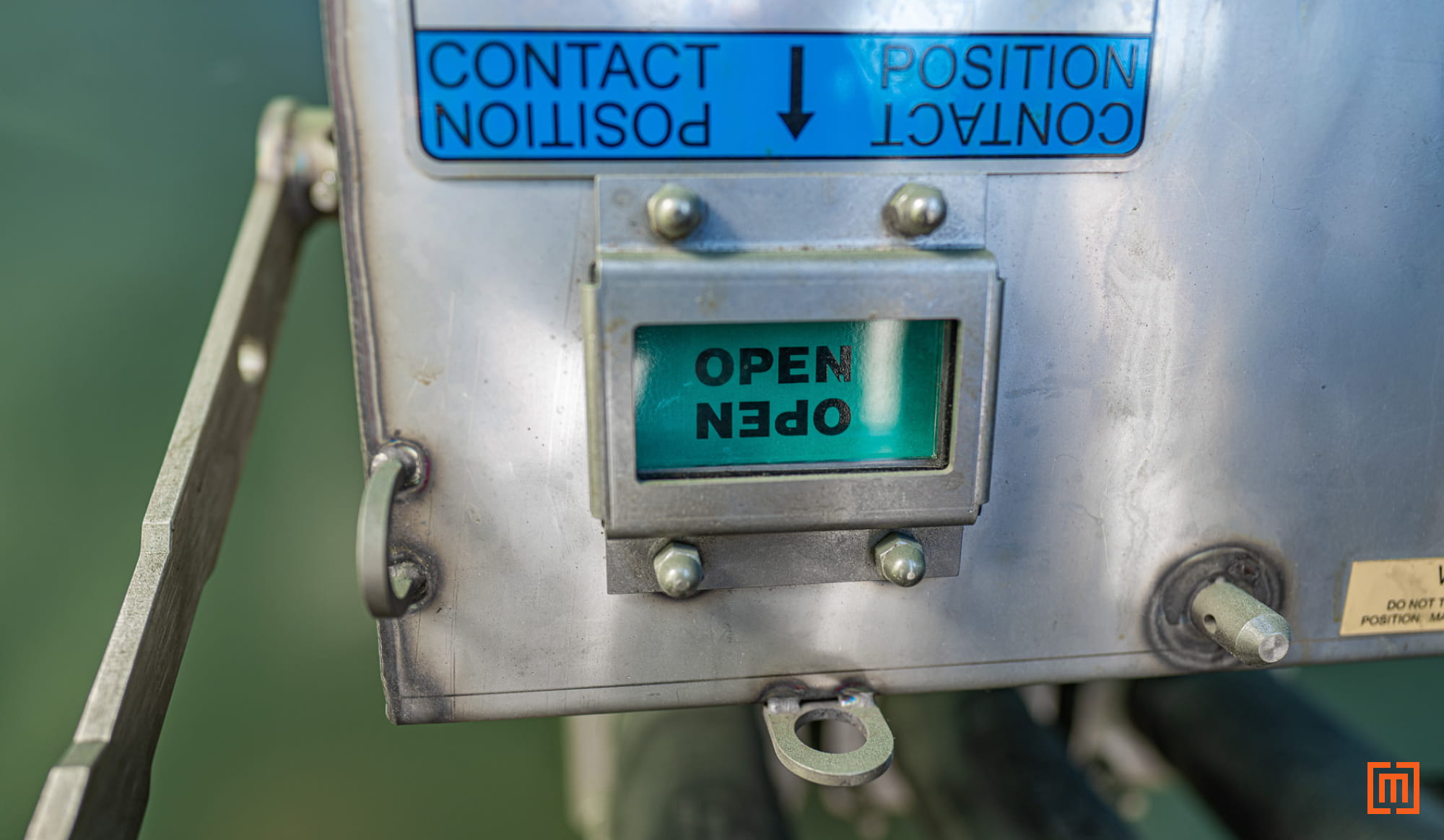 closeup of vacuum interrupter tripping mechanism in open position