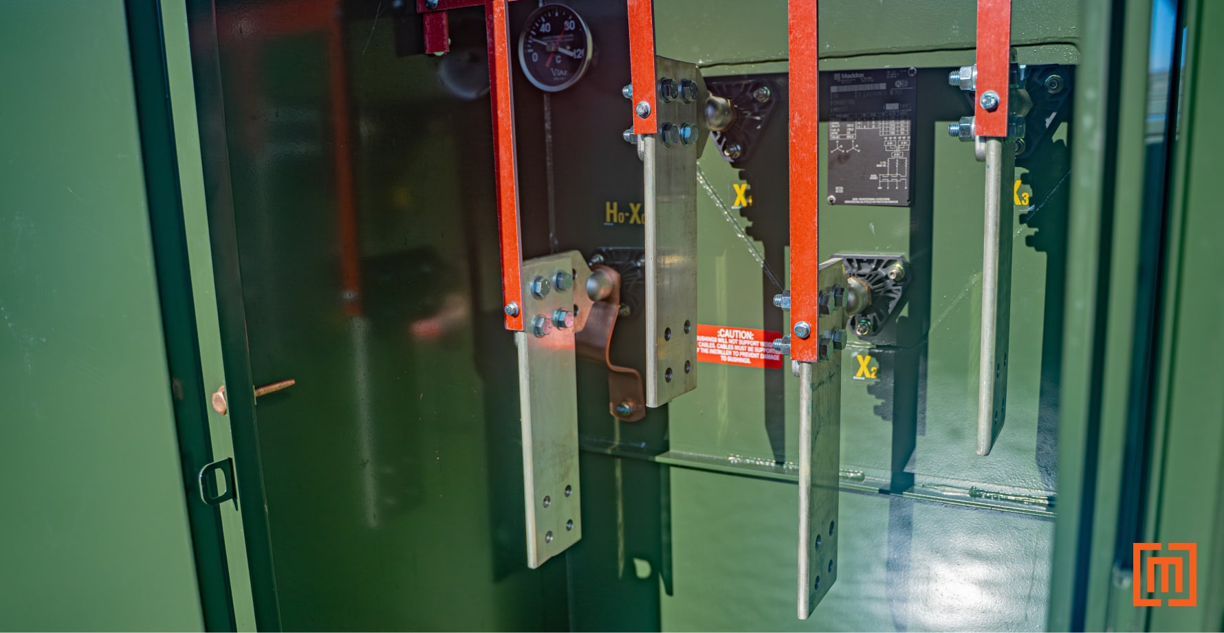 Photo of padmount transformer vertical spade extensions