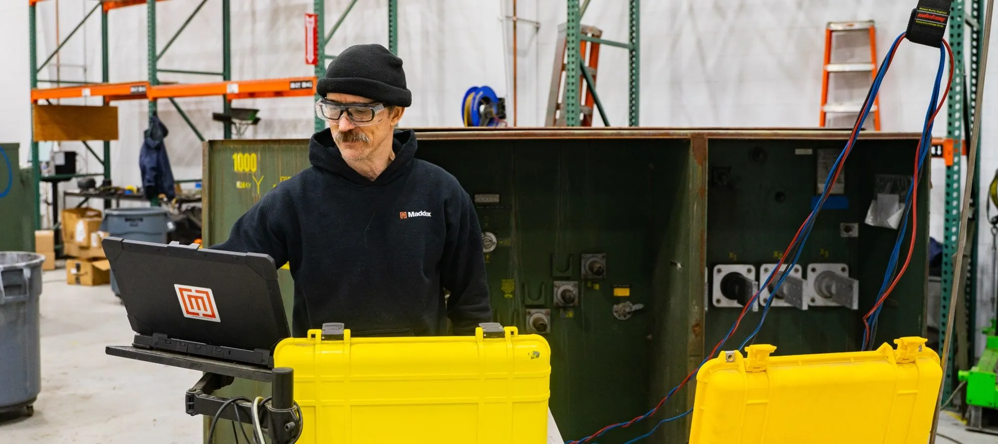 Maddox Transformer inventory tech testing a surplus transformer with a winding resistance and TTR test.