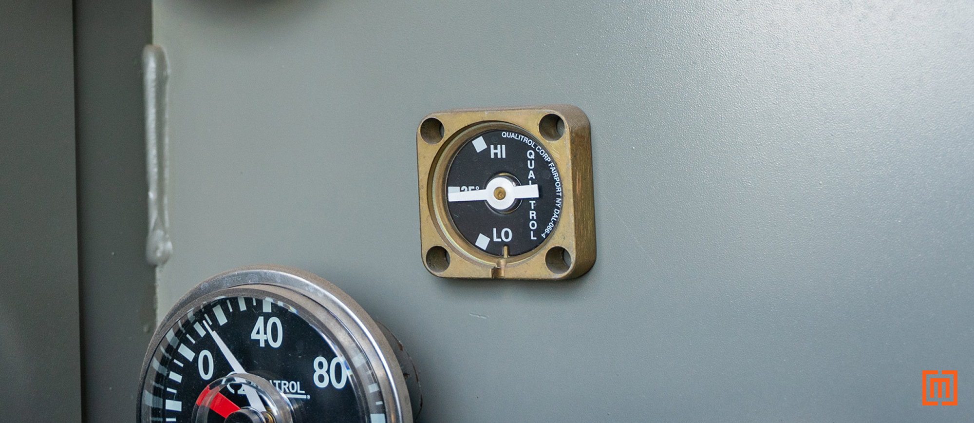 photo closeup of fluid level gage on a transformer