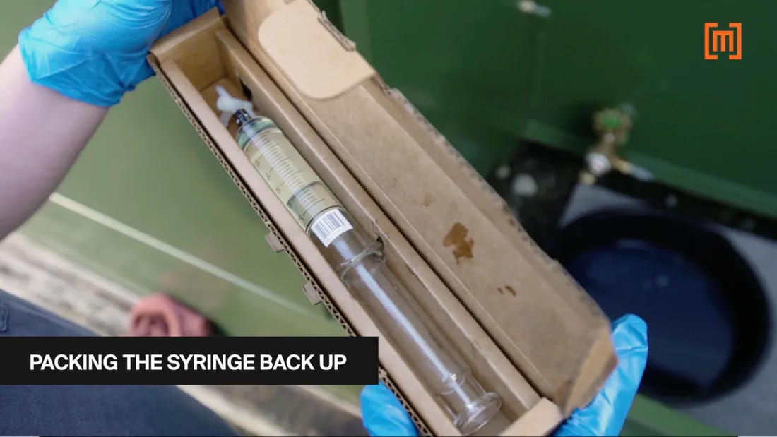 The DGA oil test syringe in a card board box before shipping off for testing