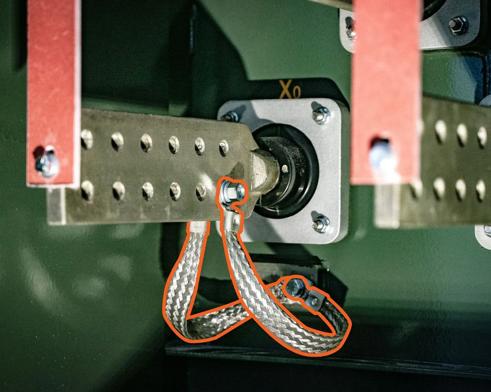 Grounding strap on a padmount transformer spade