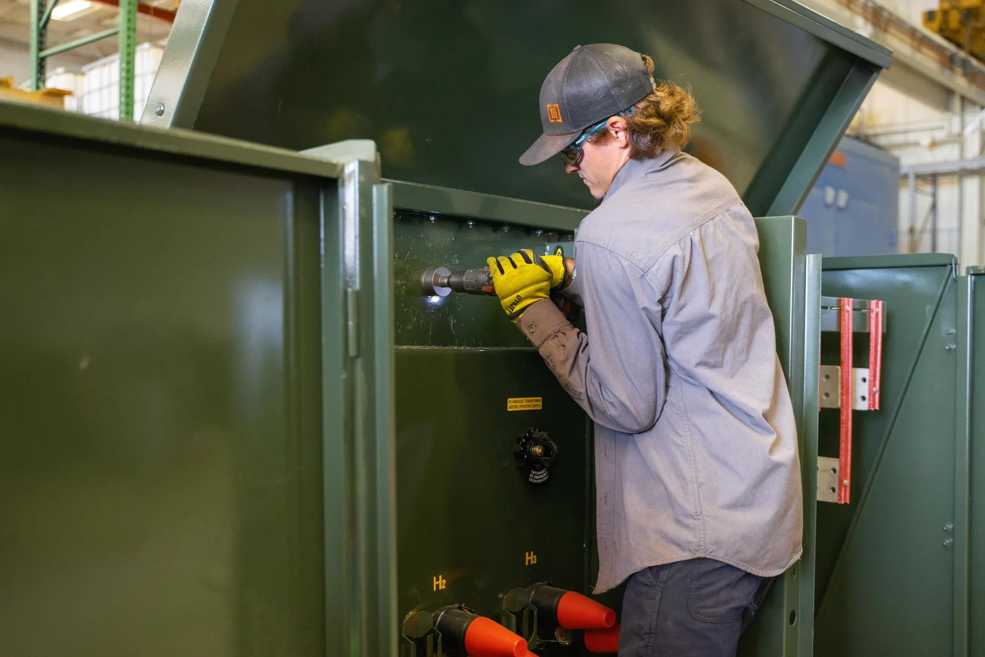 Maddox transformer tech working on a padmount transformer
