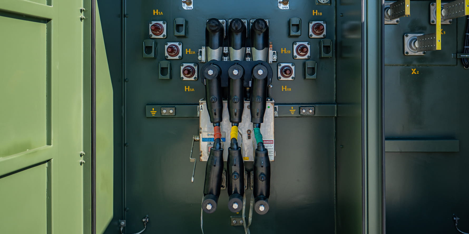 photo of vacuum interrupter integrated into green padmount